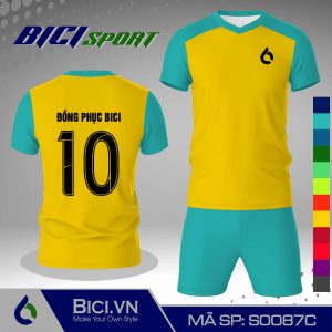 Áo đá banh màu vàng cúc phối xanh ya nổi bật